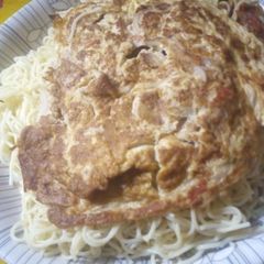 A picture of Spaghetti with sauce.