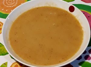 Foto principal de Puré de garbanzos con verduras y tripa de cordero