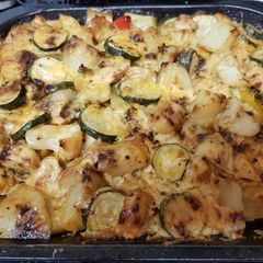 A picture of My peppered Chicken, Sausage fully loaded cheesy Bake.
