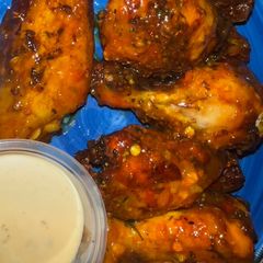 A picture of Airfried Panama Wingz with Steak Fries.
