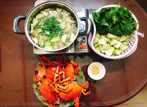 Hình của món Lẩu cua nấu bầu.