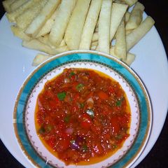 A picture of Fried yam with sauce.