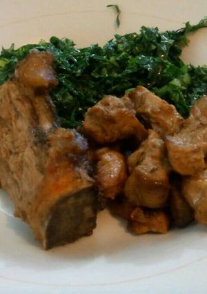 A picture of Fried beef and sukumawiki.
