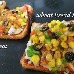 A picture of Wheat Bread Pizza on tava.