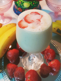 A picture of Banana Strawberry with vanilla ice cream Delight.