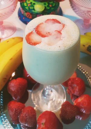 A picture of Banana Strawberry with vanilla ice cream Delight.