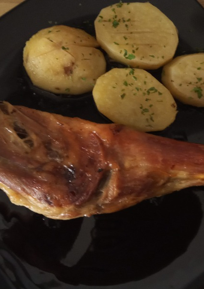 Una foto de Paletillas de Cabrito Asadas