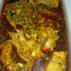 A picture of Banga soup and fresh fish.
