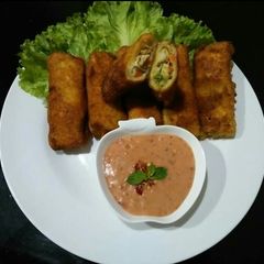 A picture of Crumbed Mayo Chicken bread Rolls with mayo chilli dip😋.