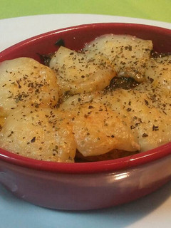 Una foto de Cocotte con ñoquis, espinacas y queso de cabra