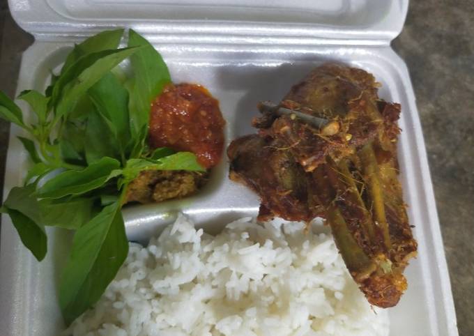 Nasi bebek bumbu kuning with sambal terasi..