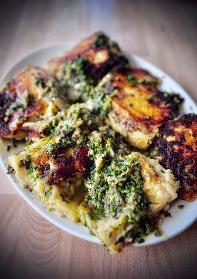 Una foto de Bacalao en salsa verde