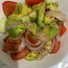 A picture of Avocado 🥑 Tomato 🍅 Salad 🥗.