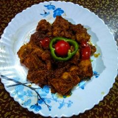 A picture of Chicken Tikka masala.