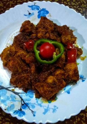 A picture of Chicken Tikka masala.