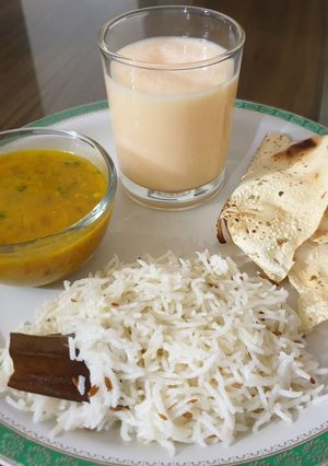 A picture of Daal fry and jeera rice.
