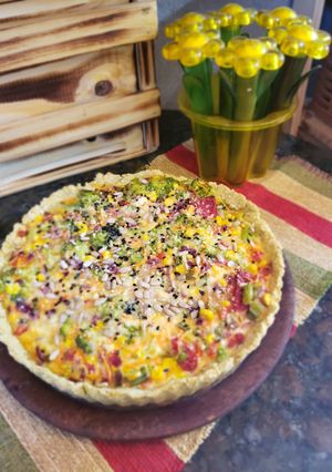 Una foto de Tarta multicolor💛💚❤
