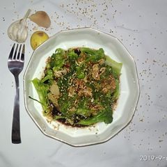 A picture of Steamed Broccoli with soy Ginger.