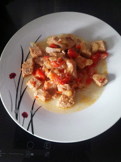 Una foto de Magro con tomate (olla gm g)
