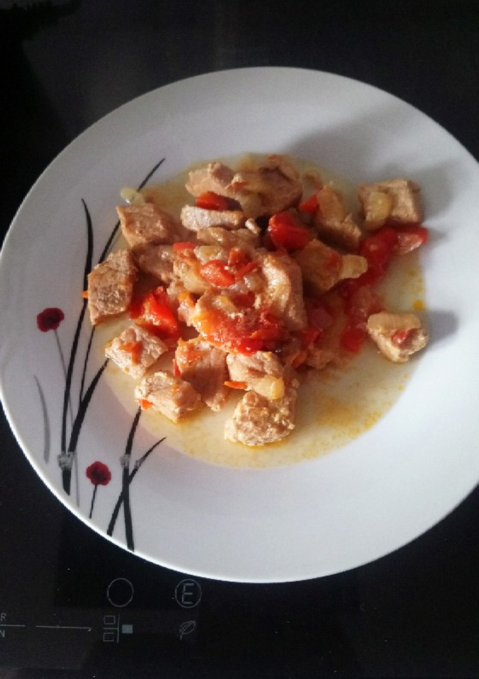 Una foto de Magro con tomate (olla gm g)