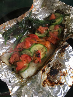 Una foto de Pescado con jengibre y verduras al vapor