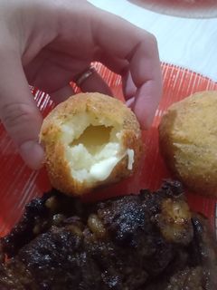 Una foto de Bombas de papa con queso