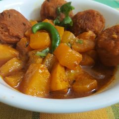 A picture of Radish Potato Curry with Masoor Dal Dumplings.