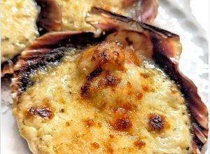 Foto principal de Vieiras gratinadas en su concha