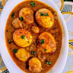 A picture of Egg Potato Masala Curry.