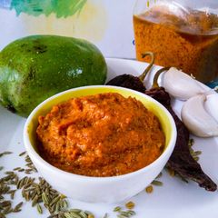 A picture of Mango chutney with whole spices.