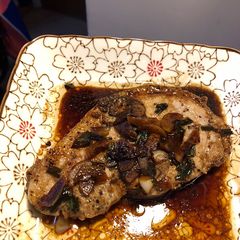 A picture of Pan fried pork chop with soy sauce.