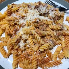 A picture of Fusilli with tuna and tomato sauce.