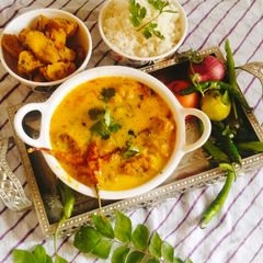 A picture of Curd Kadhi (pakoda curry/ kadhi).