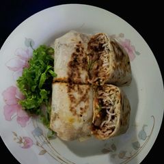 A picture of Paneer and Beans Burrito wrap.