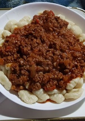 Una foto de Ñoquis de papas a la bologñesa