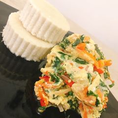 A picture of Vegetable omelette and boiled yam.