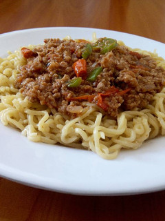 A picture of Wet fried minced meat with Indomie.