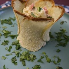 A picture of Crispy egg salad pringle cups.
