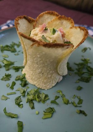 A picture of Crispy egg salad pringle cups.