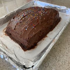 A picture of Birthday Cake - Layered Chocolate/Sugar Cake.