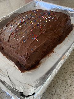 A picture of Birthday Cake - Layered Chocolate/Sugar Cake.