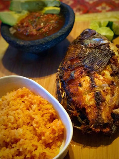 A picture of Fried mojarra" (fried fish).