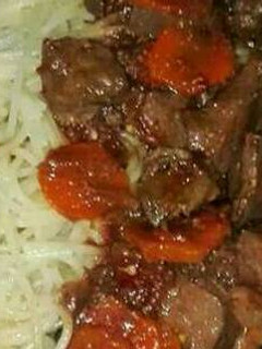 A picture of Liver stew and spaghetti.