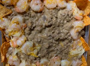 Una foto de Doritos con carne molida y camarones🍤😋