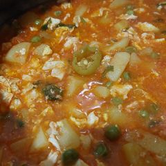 A picture of Anda aloo. (Potatoes with eggs).
