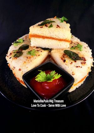 A picture of Homemade Schezwan Sauce Sandwich White Dhokla.