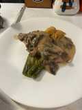 Mushroom cream sauce over braised chicken and leeks