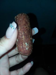 Una foto de Croquetas de pollo y salchicha