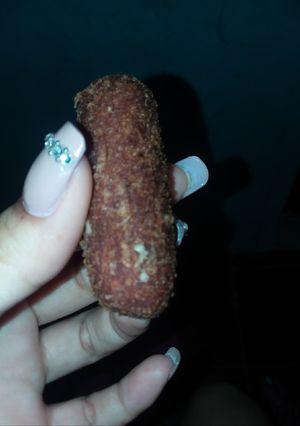 Una foto de Croquetas de pollo y salchicha