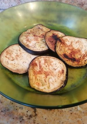 Una foto de Berenjena asada